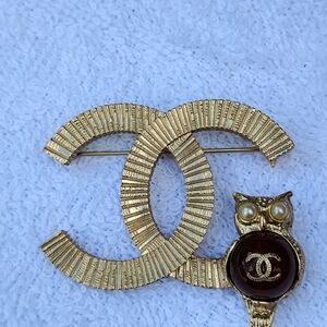 CHANEL Gold-Tone CC Logo Brooch with Owl and Dark Enamel Medallion